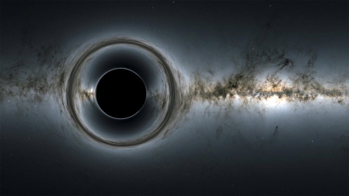Если фотон не имеет массу, почему черная дыра затягивает свет