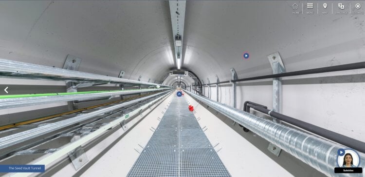 Фотографии хранилища семян в Шпицбергене. Длинный, хорошо освещенный тоннель внутри хранилища семян. Фото.